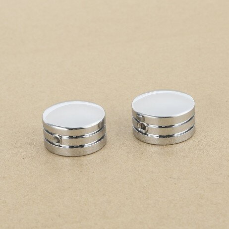 Chrómované kryty sviečok 